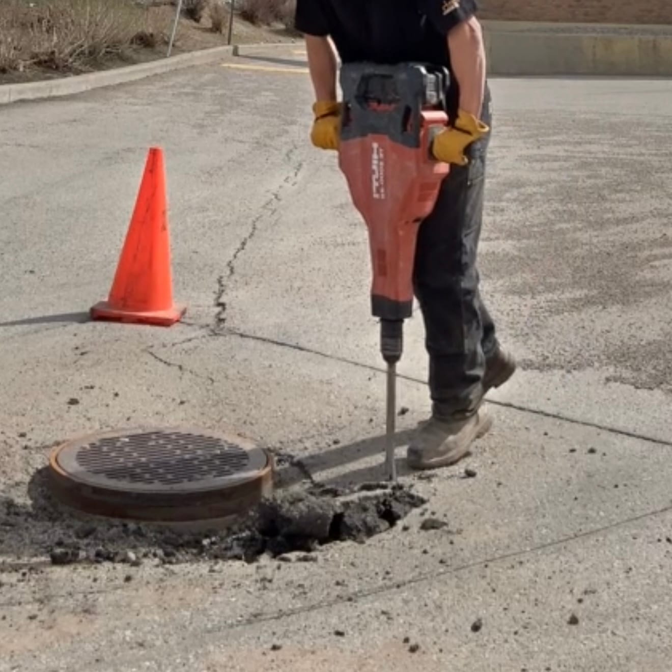 Jackhammer removal for asphalt repair, Calgary